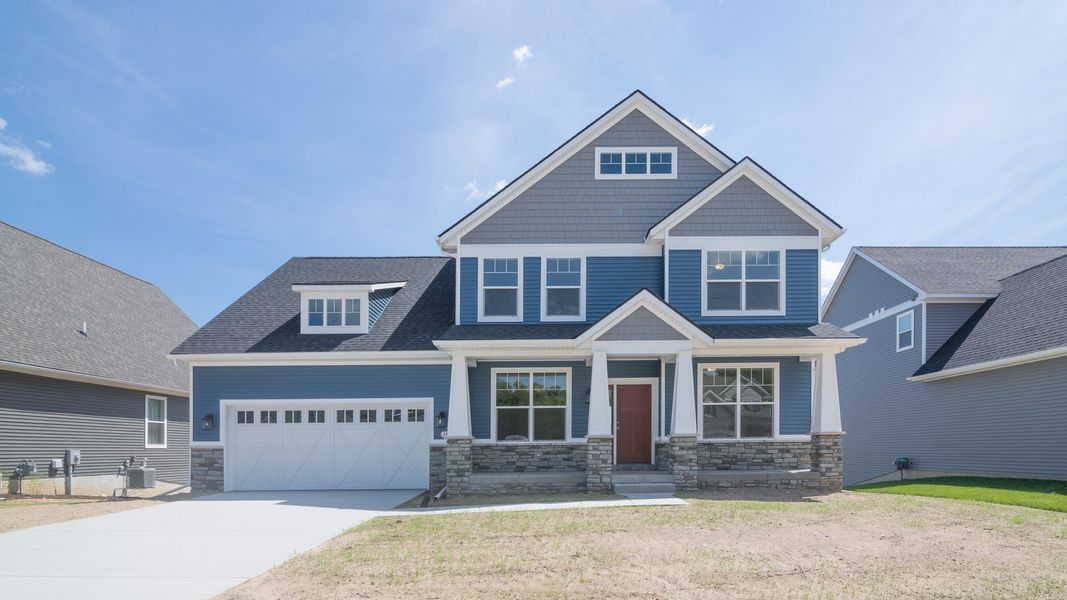 Representative exterior photo of a completed home built from the The Briarhaven III by Norfolk Homes in Coronado Estates, Jackson, MI (Image 27).