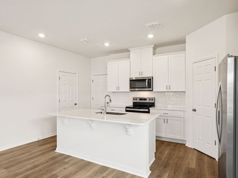 Furnished interior view inside a new home in The Meadow at Crossprairie Bungalows, St. Cloud (Image 3). Furnished interior view inside a new home in The Meadow at Crossprairie Bungalows, St. Cloud (Image 3).