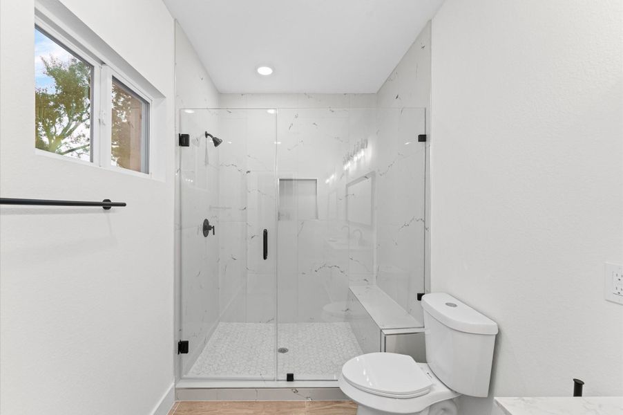 Beautifully designed bathroom with modern fixtures, upgraded lighting, and ample storage space. Beautifully designed bathroom with modern fixtures, upgraded lighting, and ample storage space.