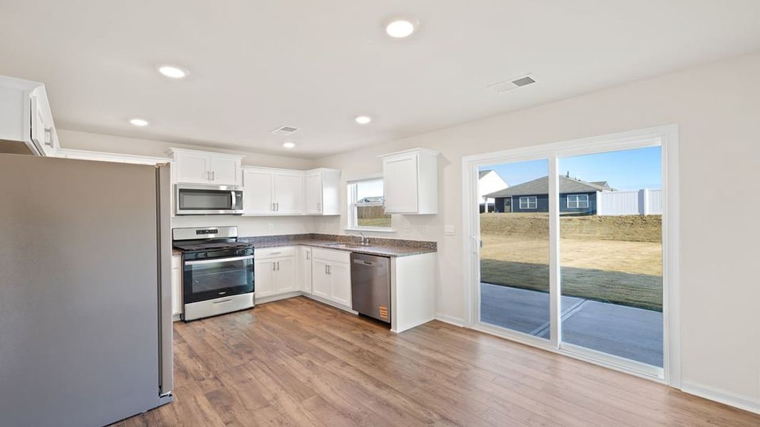 Furnished interior view inside a new home in Lightwood Cottages, Moore (Image 7).