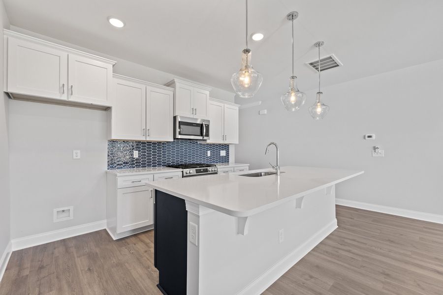 Representative furnished interior of a home built from the The Hemlock by RobuckHomes in Kennebec Crossing, Angier (Image 11).