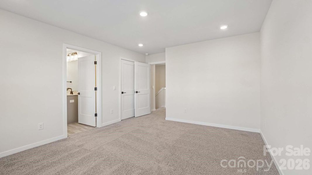 Spacious, unfurnished interior of a new home in The Townes at Lake Norman, Mooresville (Image 21).