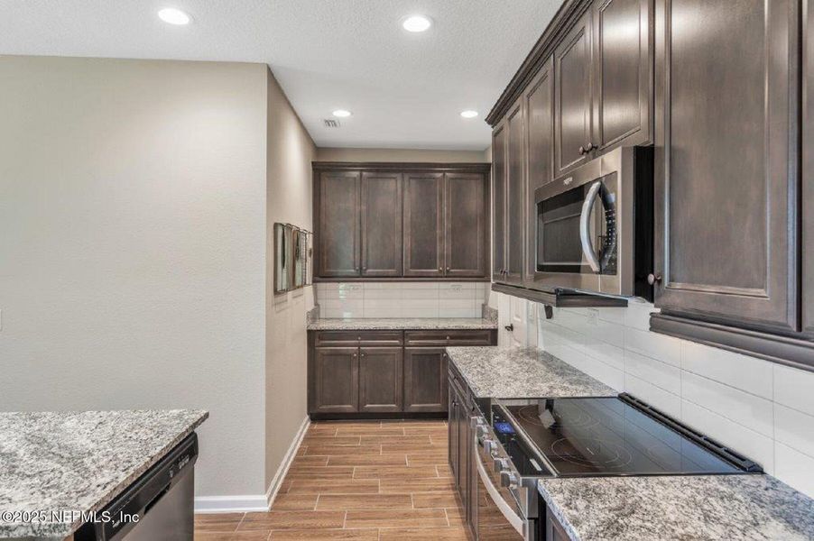 Furnished interior view inside a new home in Brook Forest - Single Family Homes, St. Augustine (Image 8).