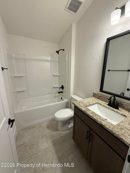Furnished interior view inside a new home in Winding Oaks, Weeki Wachee (Image 5).