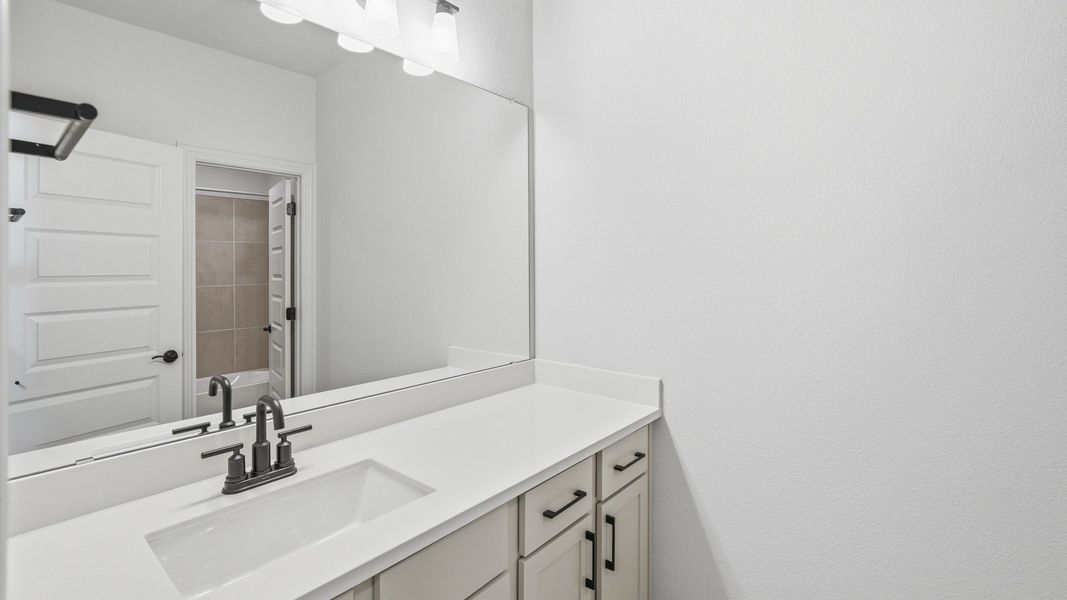 Furnished interior view inside a new home in Hawkes Landing, Leander (Image 6).