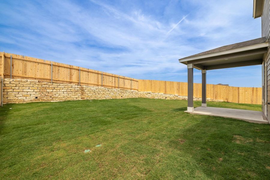 Front exterior of a new home in Salerno - Heritage Collection, Round Rock, TX, highlighting curb appeal (Image 1). Front exterior of a new home in Salerno - Heritage Collection, Round Rock, TX, highlighting curb appeal (Image 1).