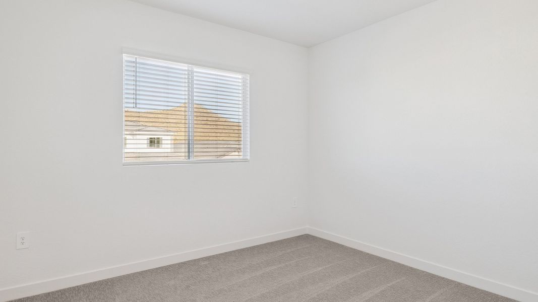 Representative unfurnished interior of a home built from the Crow by D.R. Horton in The Ridge at Stone Butte, Phoenix (Image 42).