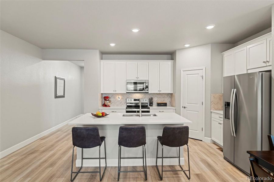 Furnished interior view inside a new home in Murphy Creek, Aurora (Image 8).