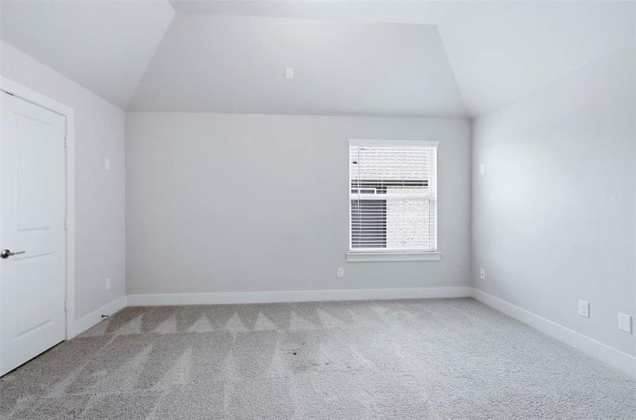 Media room, teen retreat, or possible 6th bedroom with its own walkway entry and pre-wiring for speakers.