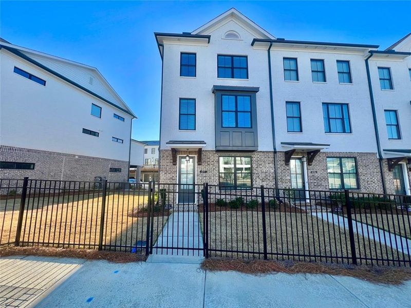 Front exterior of a new home in , Buford, GA, highlighting curb appeal (Image 18).