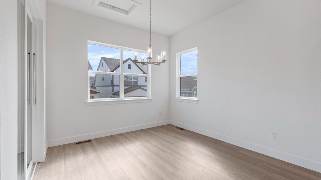 Furnished interior view inside a new home in Dillon Pointe - Journey, Broomfield (Image 12).