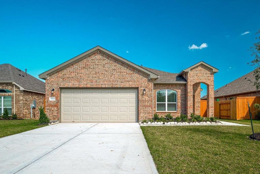 Front exterior of a new home in Cypress Green, Hockley, TX, highlighting curb appeal (Image 23).