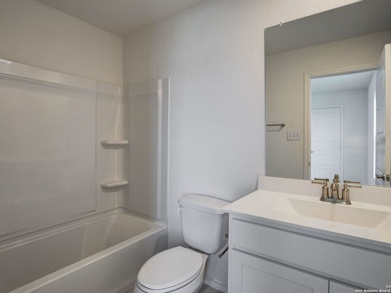 Furnished interior view inside a new home in Hannah Heights, Seguin (Image 10).