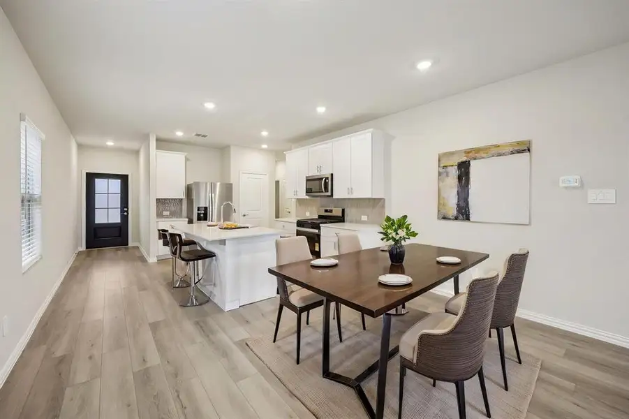 Furnished interior view inside a new home in Parks at Foster Crossing - Spring Series, Anna (Image 6).