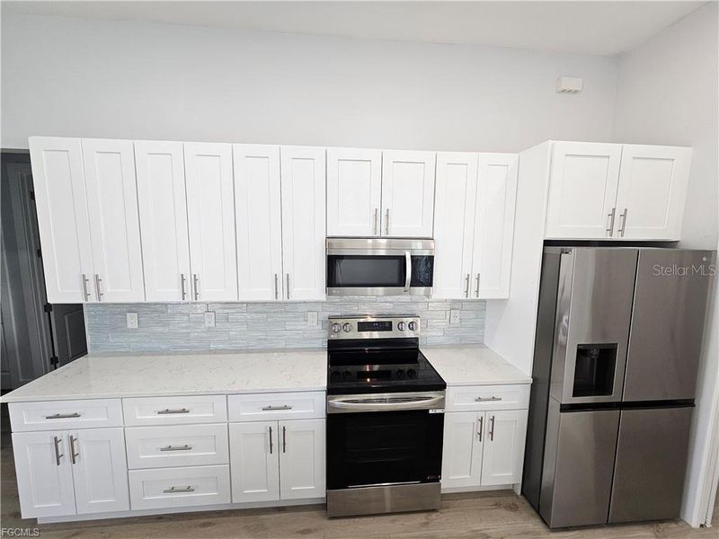 Furnished interior view inside a new home in , Cape Coral (Image 14).