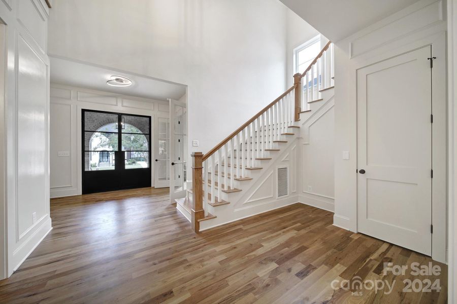 Front foyer with 1/2 bath and closet