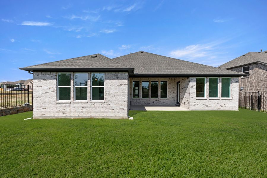 Exterior details and patio area of a home in Nelson Lake Estates, Rockwall (Image 3).