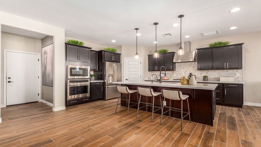 Representative furnished interior of a home built from the Pewter by Taylor Morrison in Travisso Siena Collection, Leander (Image 7). Representative furnished interior of a home built from the Pewter by Taylor Morrison in Travisso Siena Collection, Leander (Image 7).