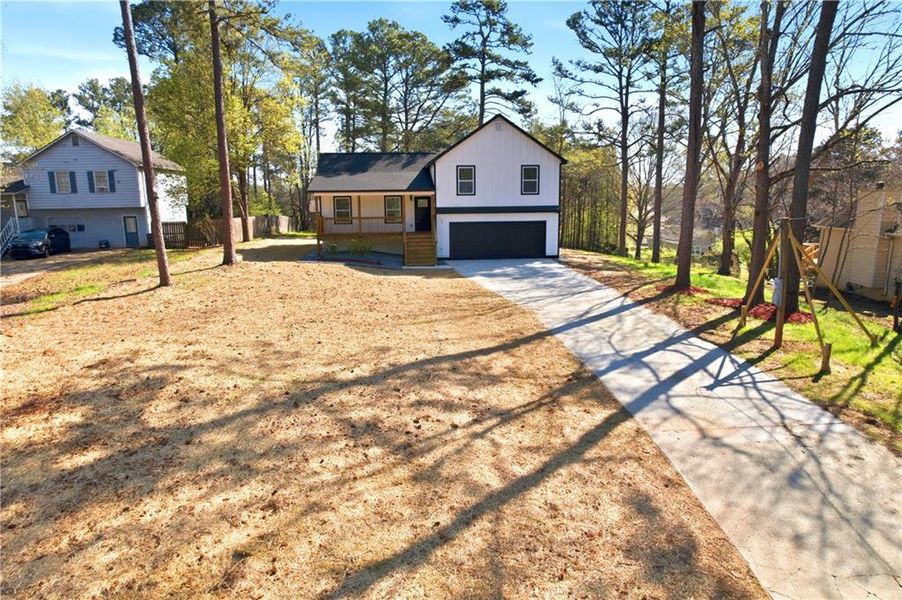 Front exterior of a new home in , Hiram, GA, highlighting curb appeal (Image 16). Front exterior of a new home in , Hiram, GA, highlighting curb appeal (Image 16).