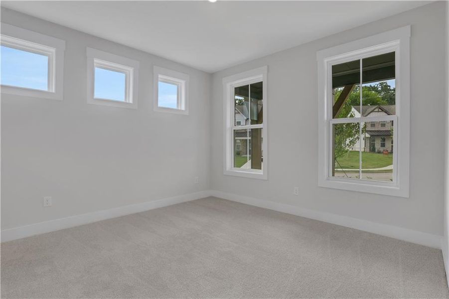 Spacious, unfurnished interior of a new home in The Paddocks at Doc Hughes, Buford (Image 50).