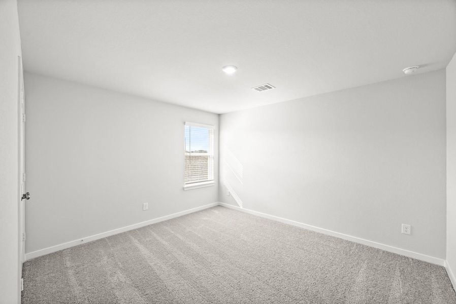 Spacious, unfurnished interior of a new home in Sunterra, Katy (Image 32).