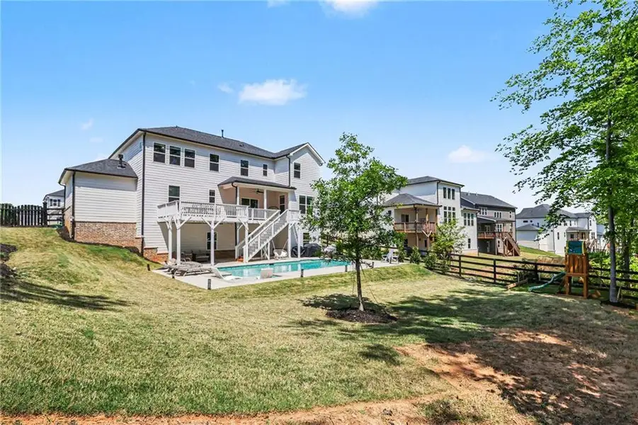 Exterior details and patio area of a home in Carmichael Farms, Canton (Image 20).