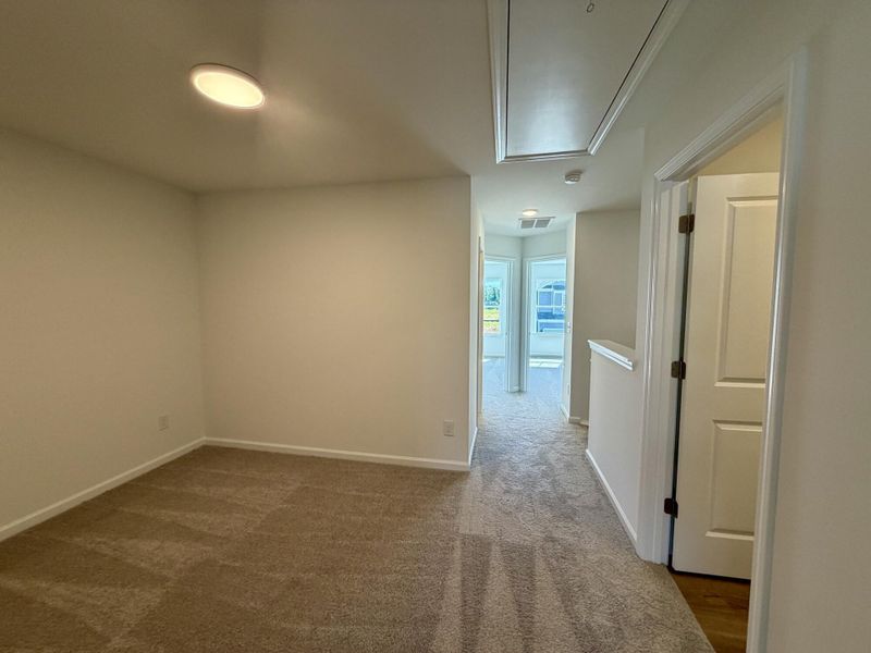 Spacious, unfurnished interior of a new home in Bellevue Townhomes, Greenville (Image 9).