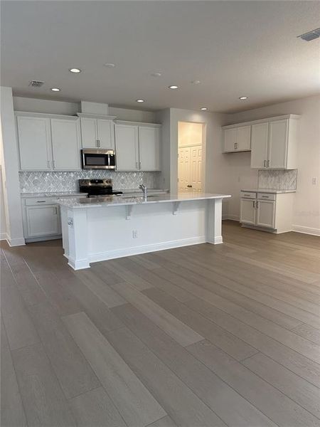 Furnished interior view inside a new home in Ridgeview, Clermont (Image 3).