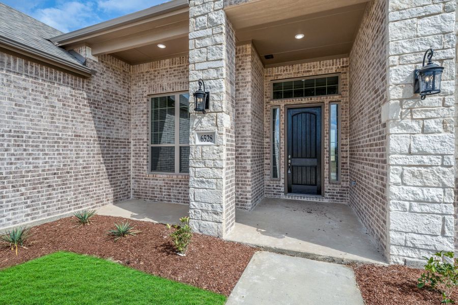 Exterior details and patio area of a home in Berkshire Estates, Mesquite (Image 4). Exterior details and patio area of a home in Berkshire Estates, Mesquite (Image 4).