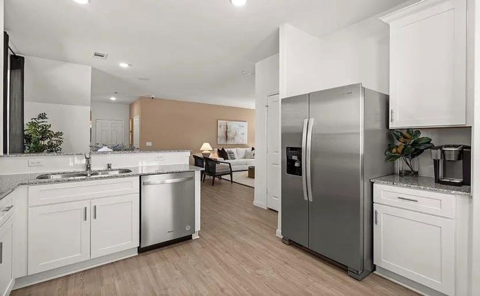 Furnished interior view inside a new home in The Pines At Seven Coves, Willis (Image 5).