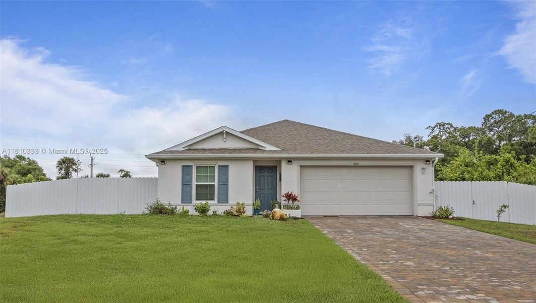 Front exterior of a new home in , Labelle, FL, highlighting curb appeal (Image 2).