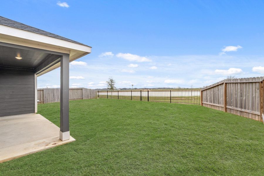ON THE WATER! Gate to the paved jogging trail around the water!