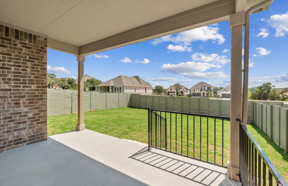 Exterior details and patio area of a home in Wolf Ranch, Georgetown (Image 25).