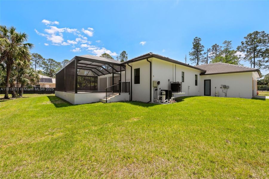 Exterior details and patio area of a home in , Naples (Image 11).