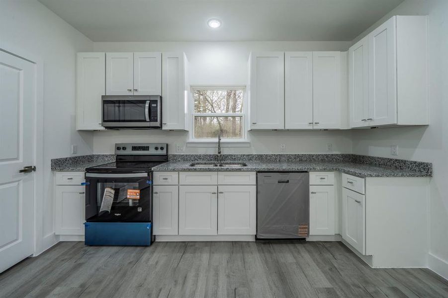 Furnished interior view inside a new home in , Log Cabin (Image 4).