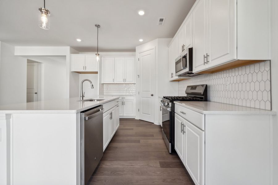 Representative furnished interior of a home built from the Madison Premier by Taylor Morrison in Stafford at Langtree, Mooresville (Image 5).