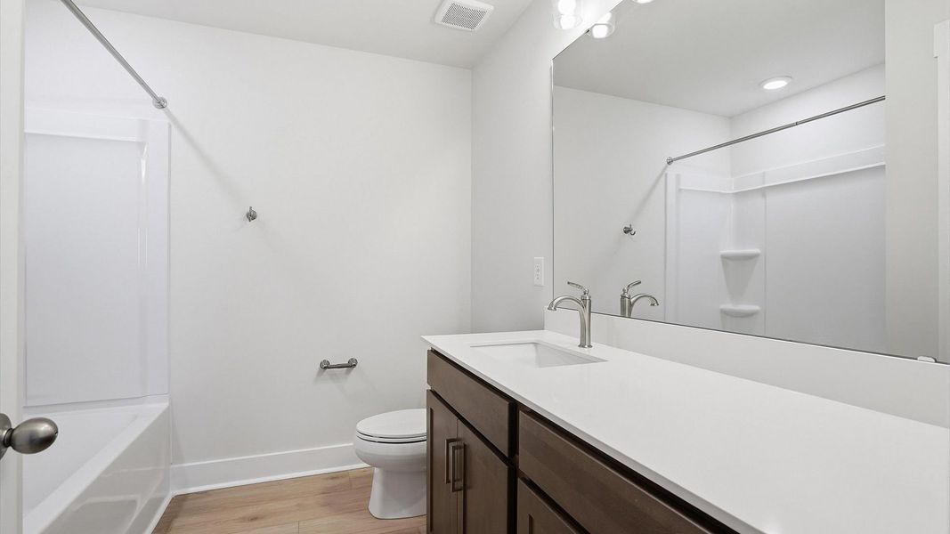 Furnished interior view inside a new home in Village at Midway, Anderson (Image 28).