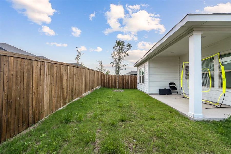 View of yard with a patio area