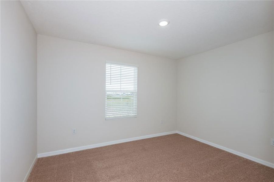 Spacious, unfurnished interior of a new home in Pasadena Woods, Dade City (Image 17).