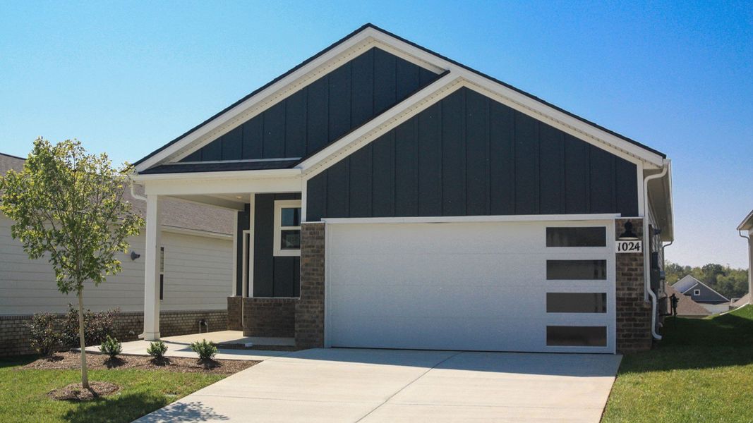 Front exterior of a new home in Nexus South, Gallatin, TN, highlighting curb appeal (Image 19). Front exterior of a new home in Nexus South, Gallatin, TN, highlighting curb appeal (Image 19).