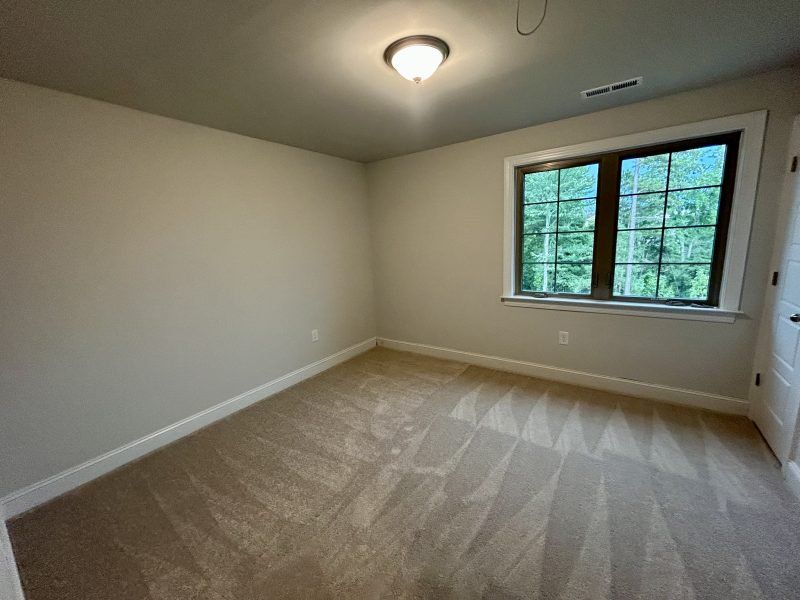 Spacious, unfurnished interior of a new home in Trellises, High Point (Image 24).