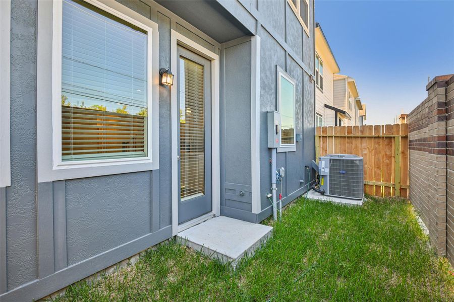 Exterior details and patio area of a home in Spring Brook Village - City Series, Houston (Image 25).