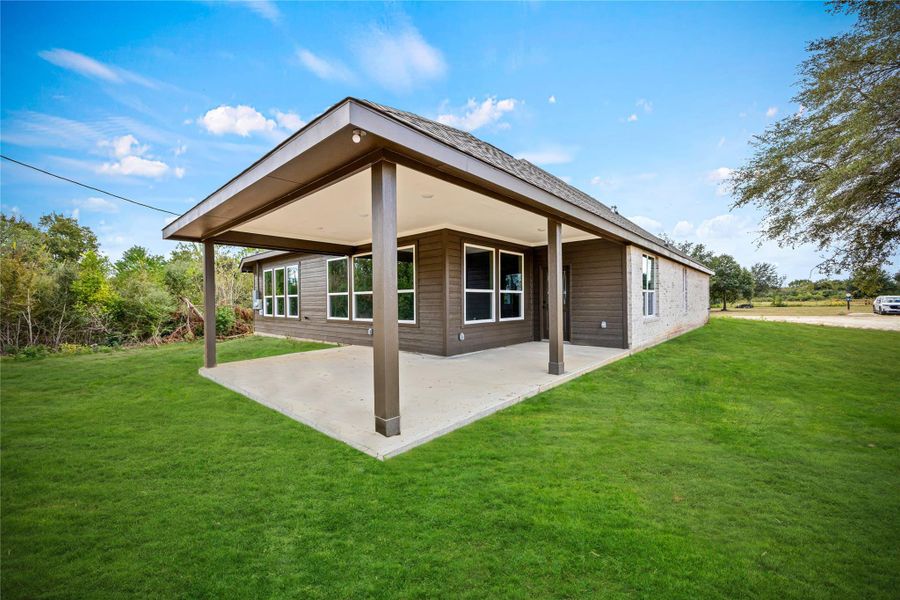 Exterior details and patio area of a home in , Prairie View (Image 4).