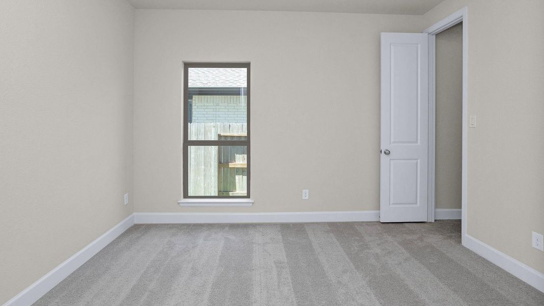Spacious, unfurnished interior of a new home in Evergreen 50', Conroe (Image 7).