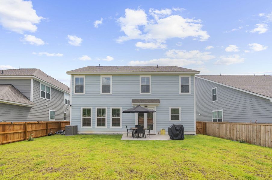Exterior details and patio area of a home in High Point at Foxbank, Moncks Corner (Image 4).