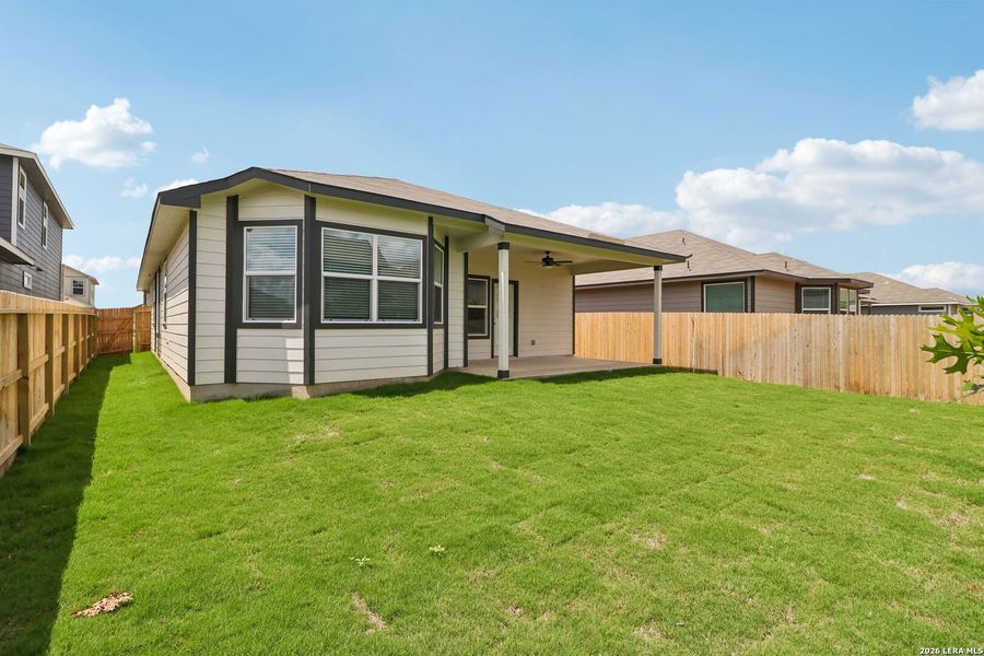 Exterior details and patio area of a home in Estancia Ranch - Premier Series, San Antonio (Image 29).