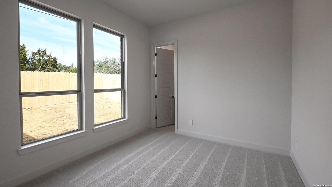 Spacious, unfurnished interior of a new home in Kinder Ranch, San Antonio (Image 17).