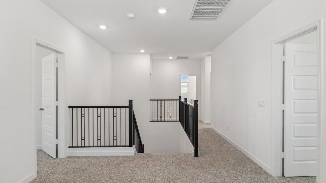 Representative furnished interior of a home built from the Crow by D.R. Horton in Zanjero Pass, Glendale (Image 18).