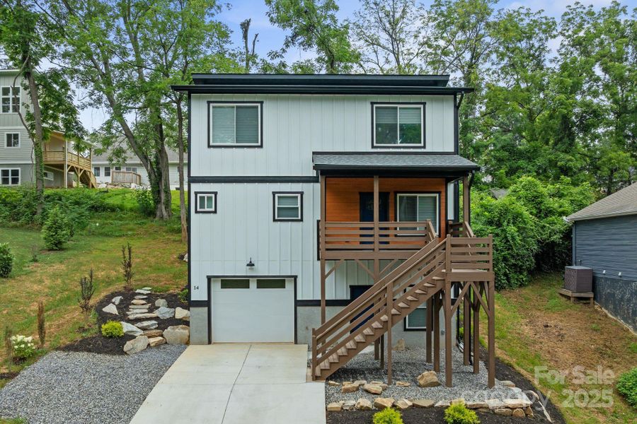 Front exterior of a new home in , Asheville, NC, highlighting curb appeal (Image 2). Front exterior of a new home in , Asheville, NC, highlighting curb appeal (Image 2).