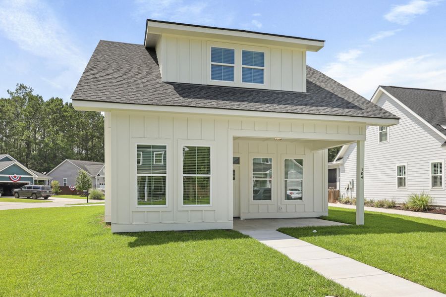 Exterior details and patio area of a home in , Huger (Image 2). Exterior details and patio area of a home in , Huger (Image 2).